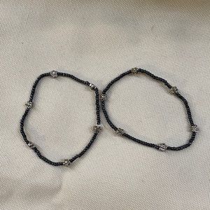 2 black bracelets